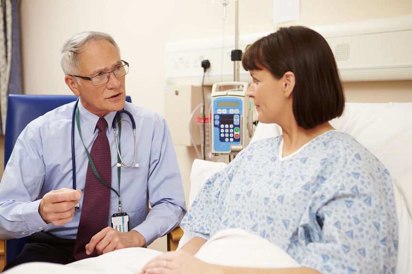 Doctor with female patient